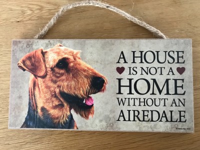 Houten bord 'A House is not....'